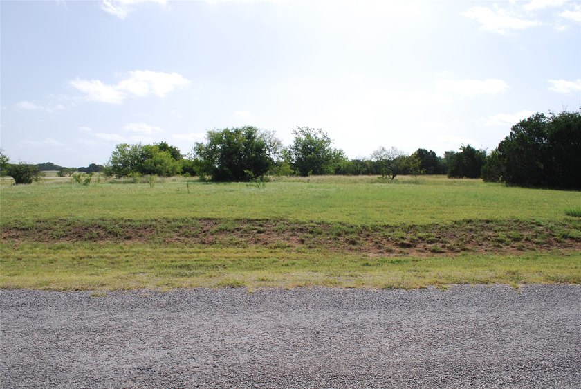 Large corner lot. Over half an acre in the front section of - photo 8