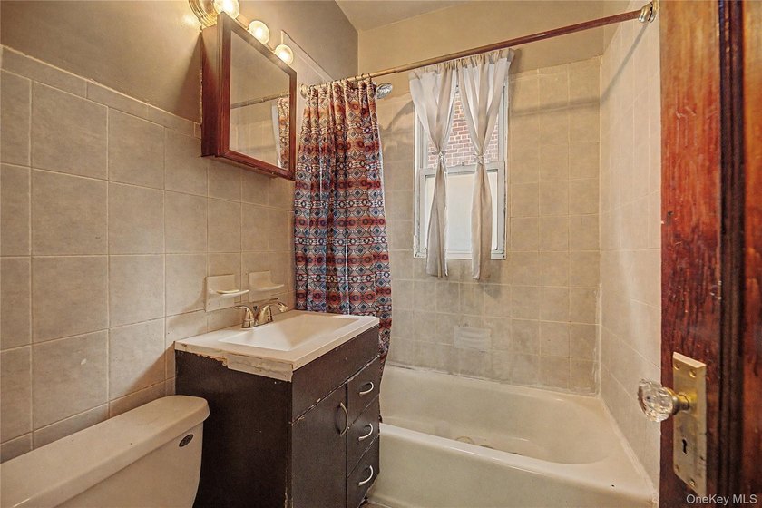 Welcome to this well-configured two-family home in the heart of - photo 8