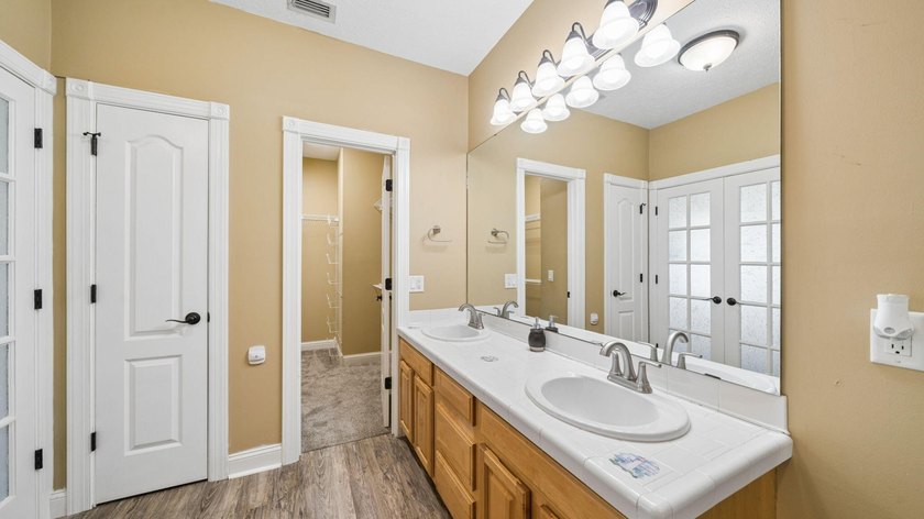 Located in a top-rated school district and tucked away on a - photo 12