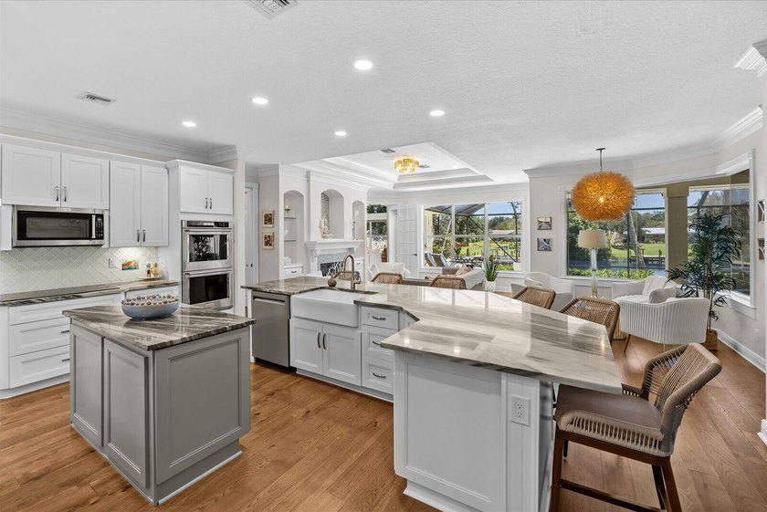 Beautiful custom-built waterfront home with private pool on wide - photo 4
