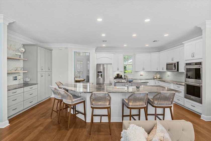 Beautiful custom-built waterfront home with private pool on wide - photo 5