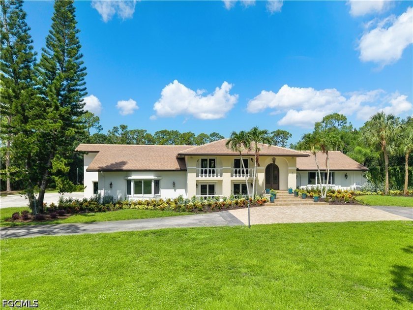 Set on nearly three private acres within the exclusive gated - photo 6