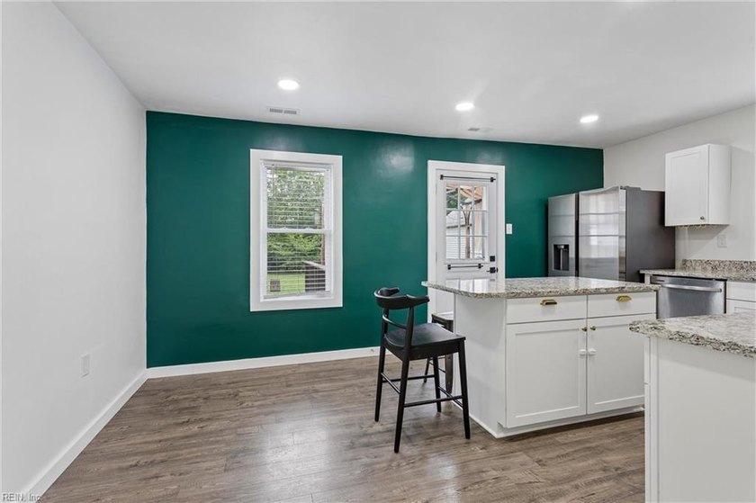 This beautifully updated home is just minutes from the beach and - photo 11