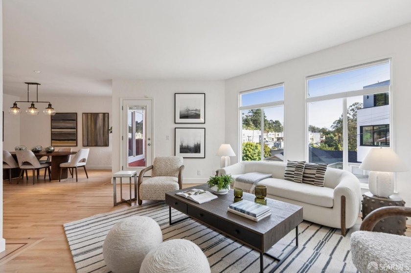 This gorgeous, light-filled home with wood floors throughout - photo 13