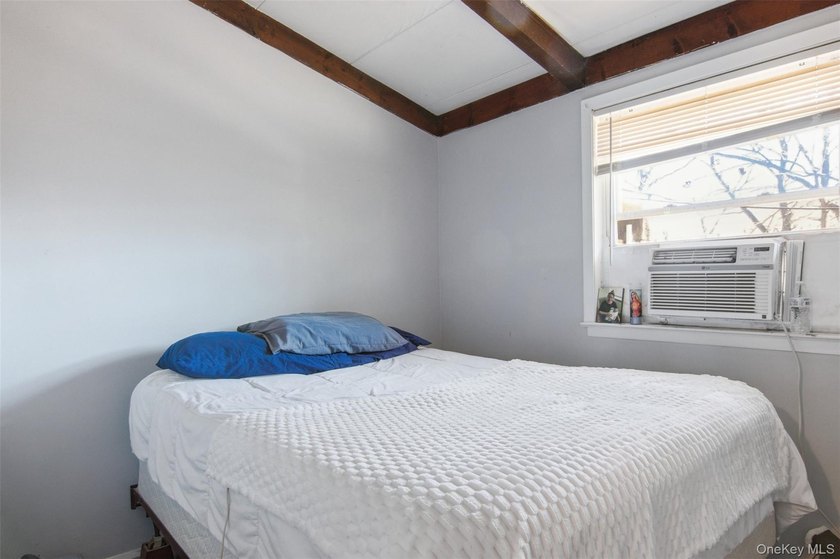 Nestled in Three Village School District, this four bedroom - photo 14