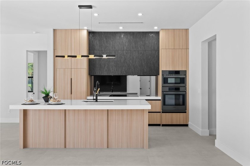 Experience luxury waterfront living in this stunning - photo 8