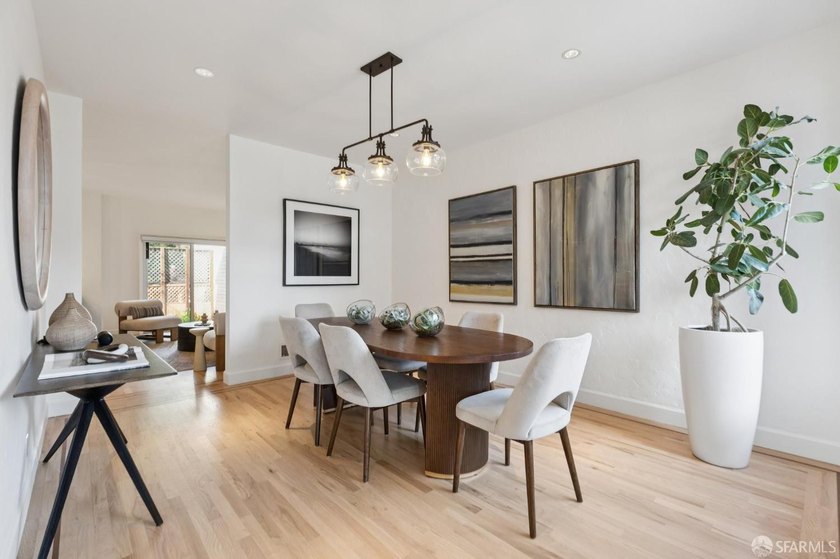 This gorgeous, light-filled home with wood floors throughout - photo 18