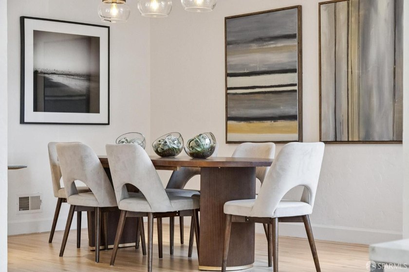 This gorgeous, light-filled home with wood floors throughout - photo 19