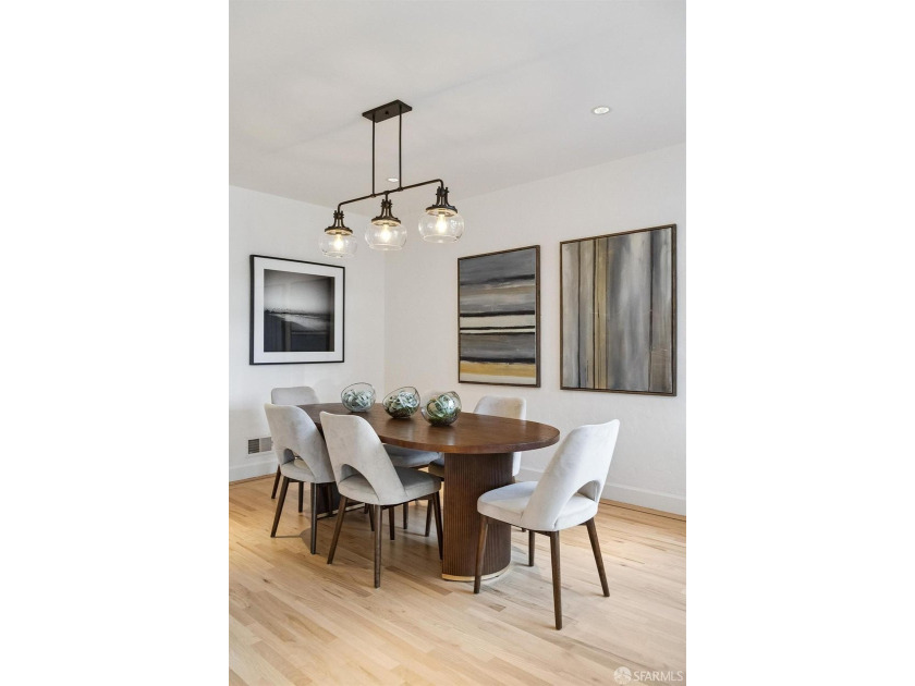 This gorgeous, light-filled home with wood floors throughout - photo 20