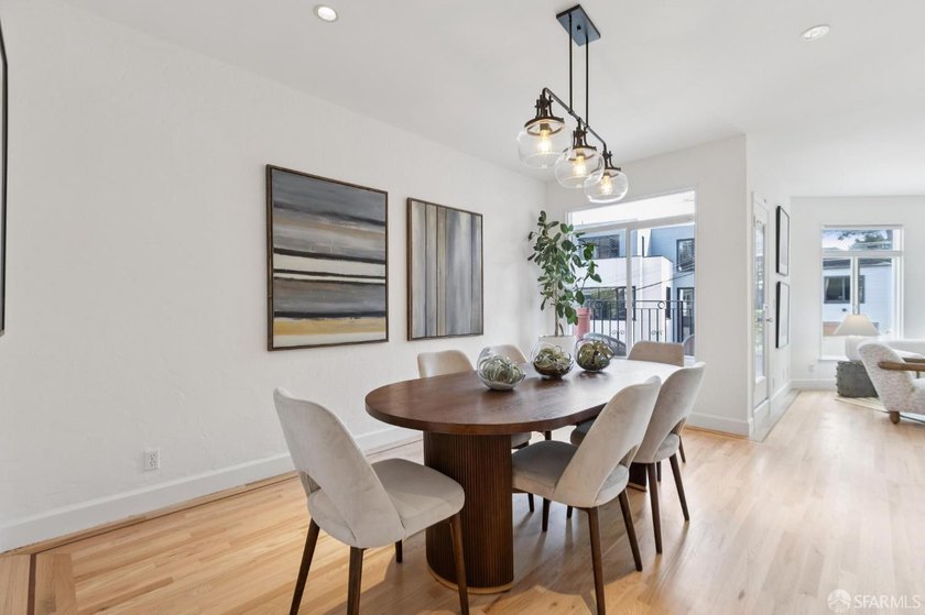 This gorgeous, light-filled home with wood floors throughout - photo 23