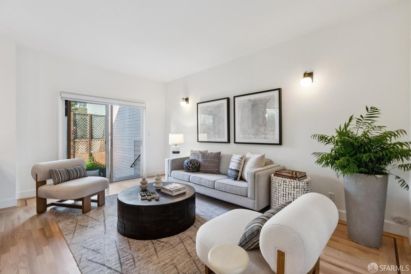 This gorgeous, light-filled home with wood floors throughout - photo 24