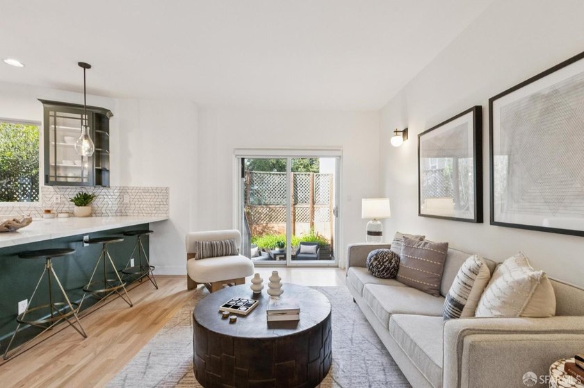 This gorgeous, light-filled home with wood floors throughout - photo 25