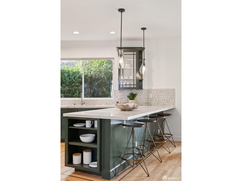 This gorgeous, light-filled home with wood floors throughout - photo 31