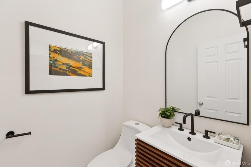 This gorgeous, light-filled home with wood floors throughout - photo 40