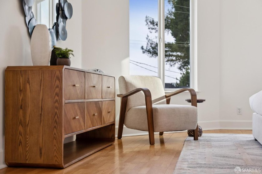 This gorgeous, light-filled home with wood floors throughout - photo 45