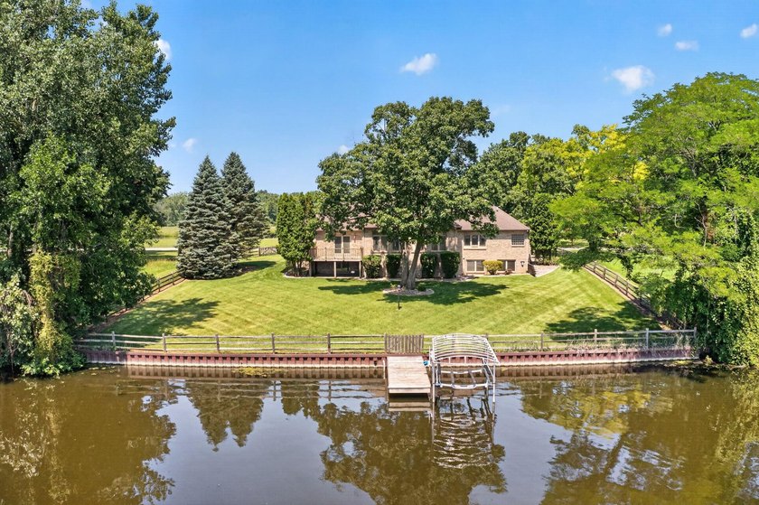 Welcome to waterfront living at its finest! Nestled on The - photo 3