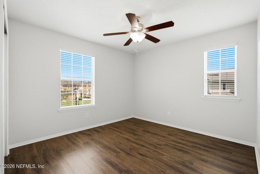 Welcome to this beautifully maintained **corner-unit townhome** - photo 19