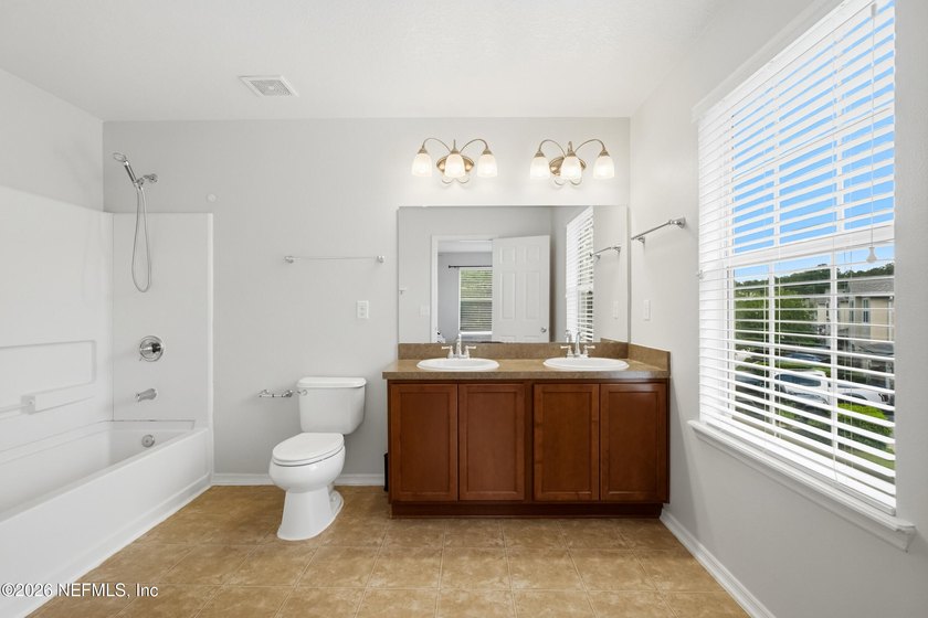 Welcome to this beautifully maintained **corner-unit townhome** - photo 29