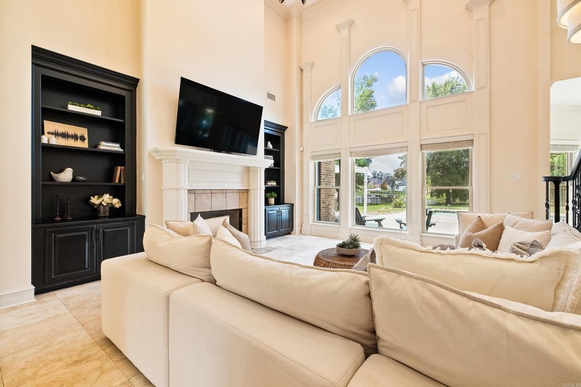 Breathtaking lake views take center stage in this exceptional - photo 6