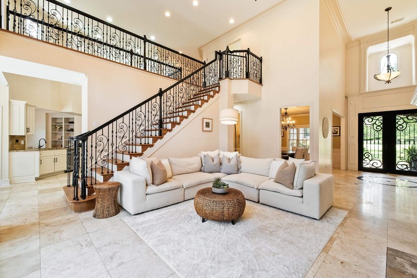 Breathtaking lake views take center stage in this exceptional - photo 7