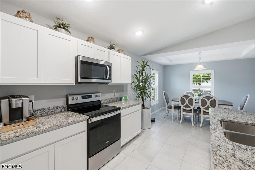 NEWER CONSTRUCTION HOME IN BURNT STORE VILLAGE | 4 BEDROOMS + - photo 8