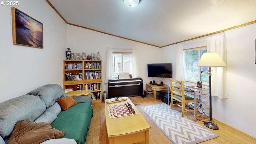 Move-in ready 1991 Skyline home in Port Orford! Features include - photo 12