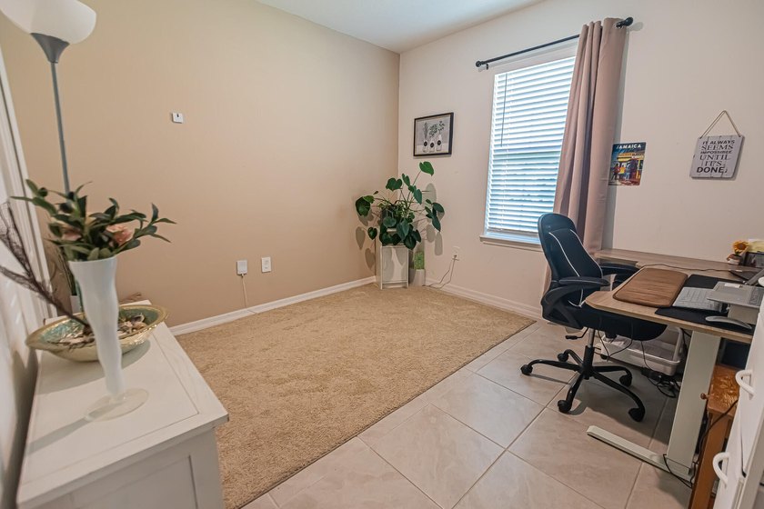 Built in 2023, this 3/2/2 CBS home perfectly combines modern - photo 11