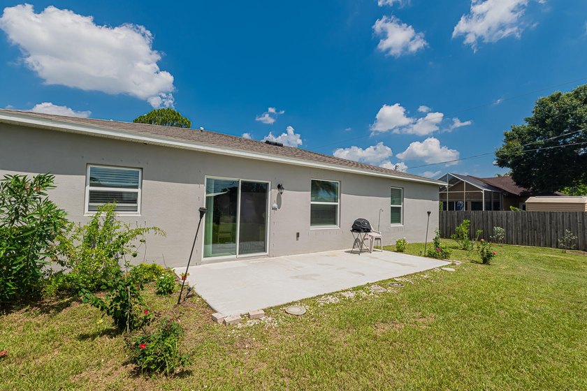 Built in 2023, this 3/2/2 CBS home perfectly combines modern - photo 13
