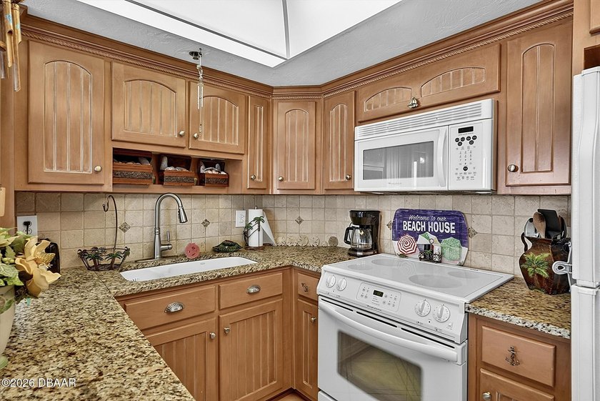 Enjoy effortless beachfront living in this beautifully - photo 2