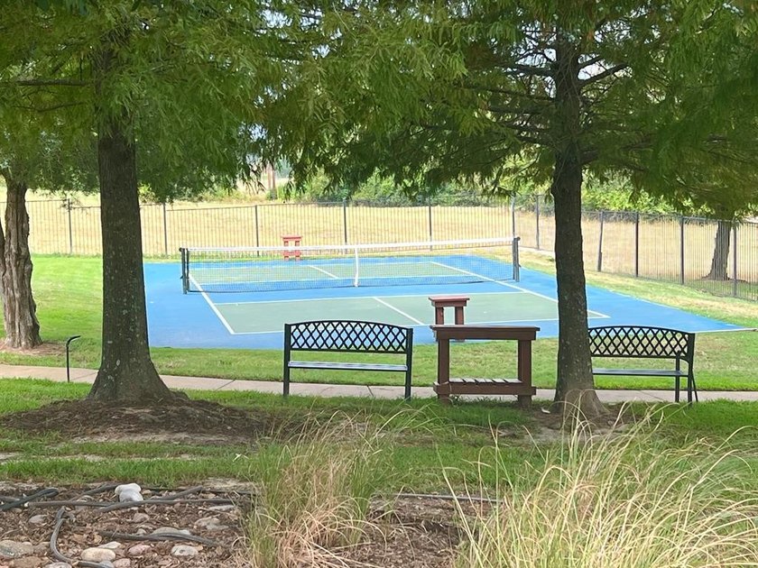 Perched on an elevated homesite in the highly sought-after - photo 13