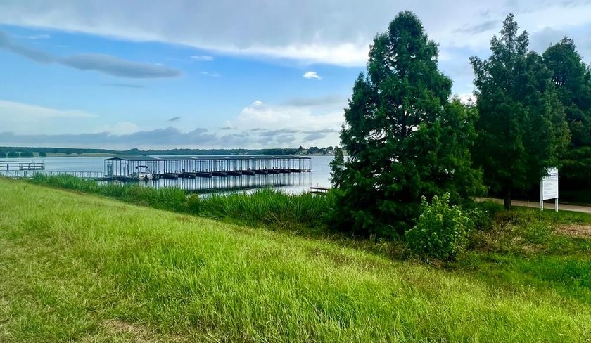 Perched on an elevated homesite in the highly sought-after - photo 14