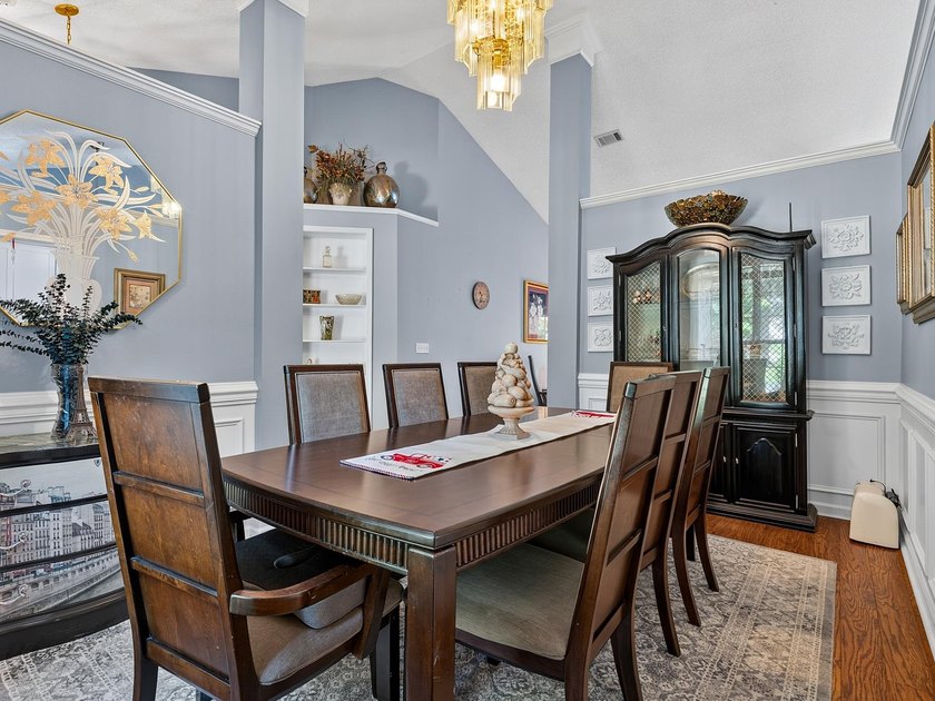Welcome home to this beautifully updated brick residence nestled - photo 11