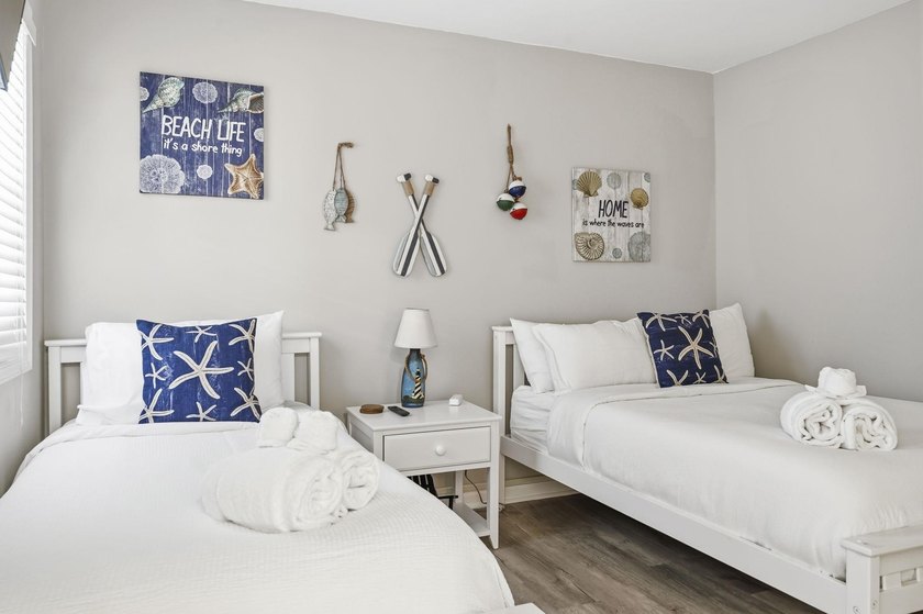 Welcome to the Coast! This 2 bedroom, 2 bathroom condo, is - photo 23