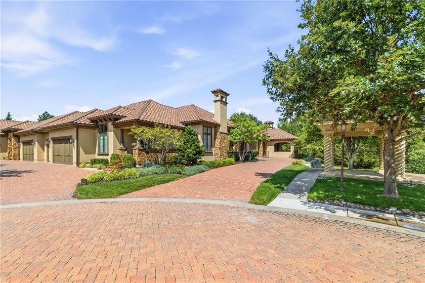 Welcome to luxury Leawood living at its finest in the highly - photo 2