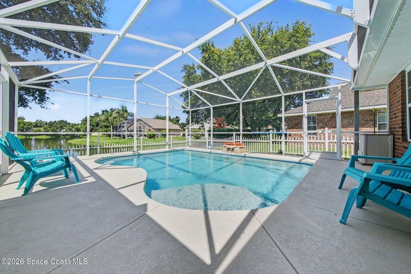 Welcome to this beautifully updated waterfront pool home located - photo 24