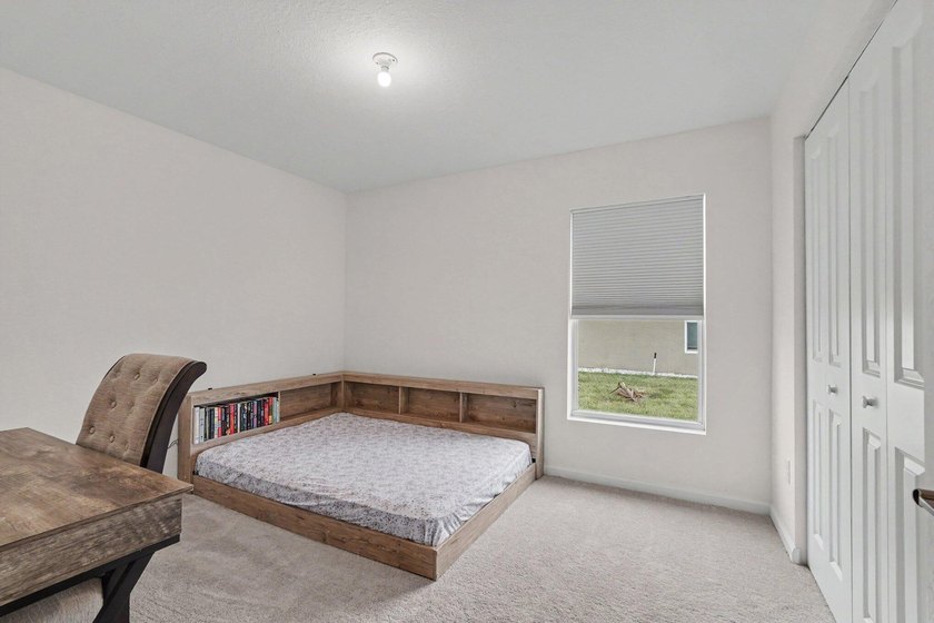 Discover this 4-bedroom, 2-bathroom single-family residence in - photo 22