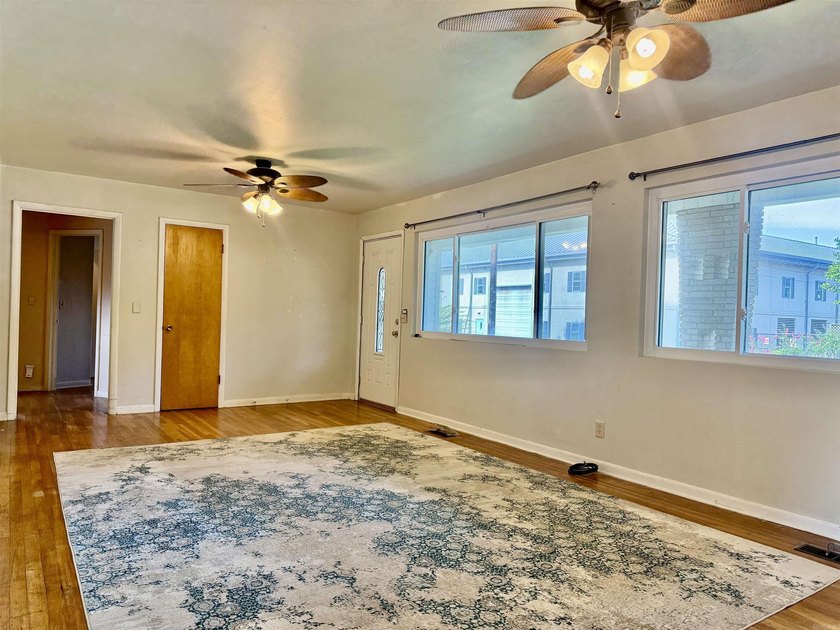 Welcome home to this charming 3-bedroom 2-bath home in a - photo 2