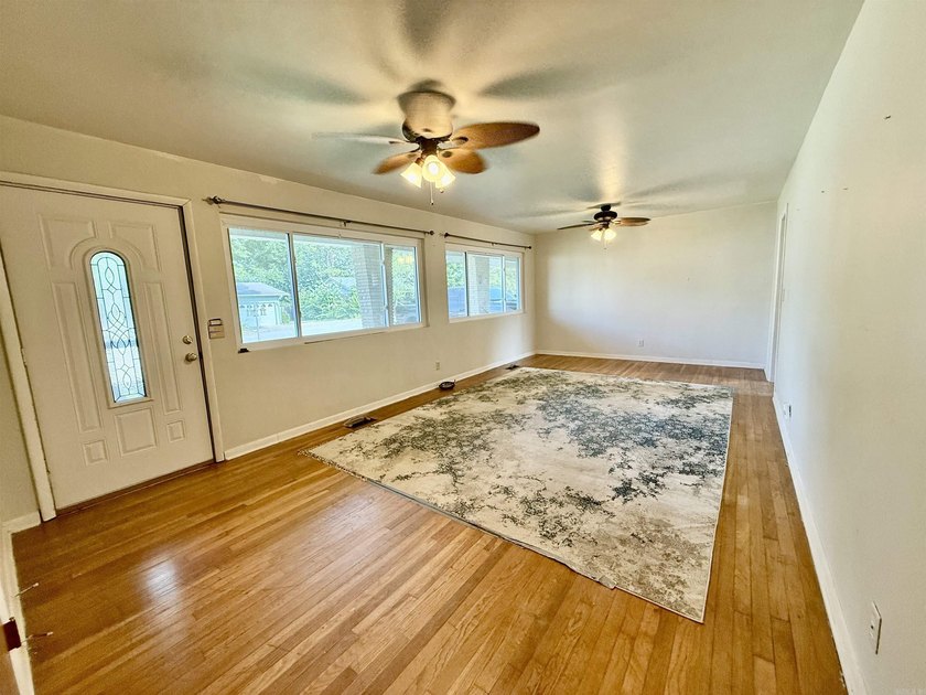 Welcome home to this charming 3-bedroom 2-bath home in a - photo 3