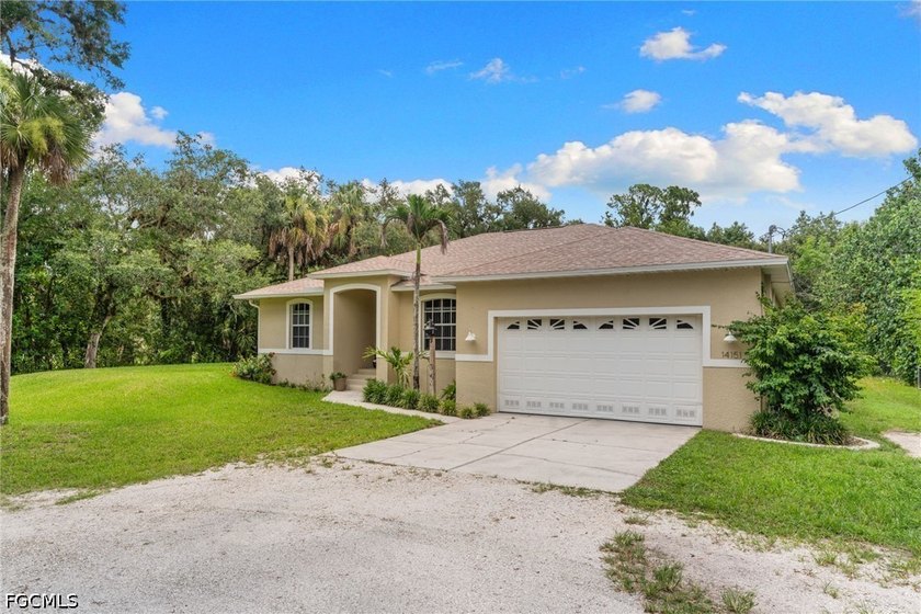 This home is in a BEAUTIFUL SETTING. It's tucked back into a - photo 2