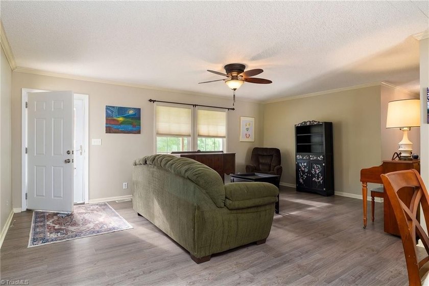 Tucked away on 1.17+/- acres, this property offers the perfect - photo 3