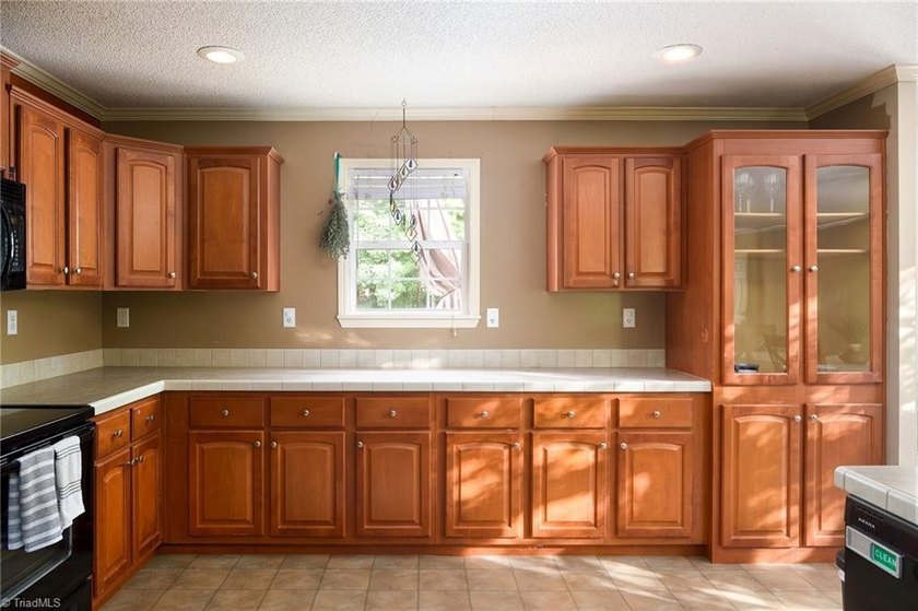 Tucked away on 1.17+/- acres, this property offers the perfect - photo 8