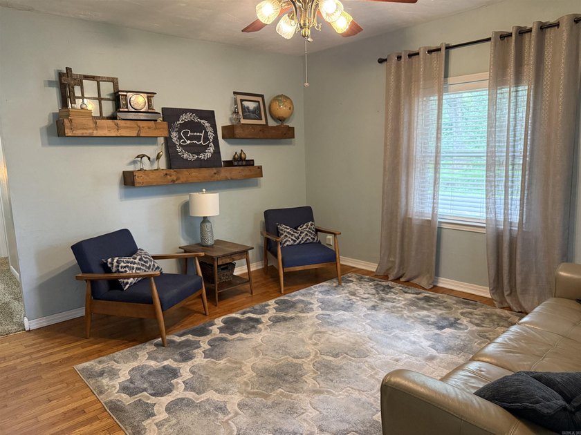 Welcome home to this charming 4-bedroom, 2-bath home nestled in - photo 2