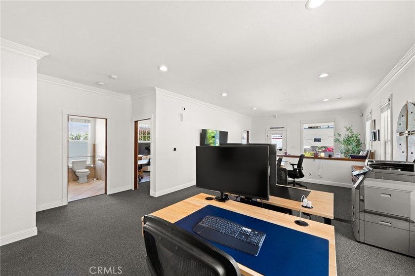 Turnkey freestanding office building with gated parking lot for - photo 8