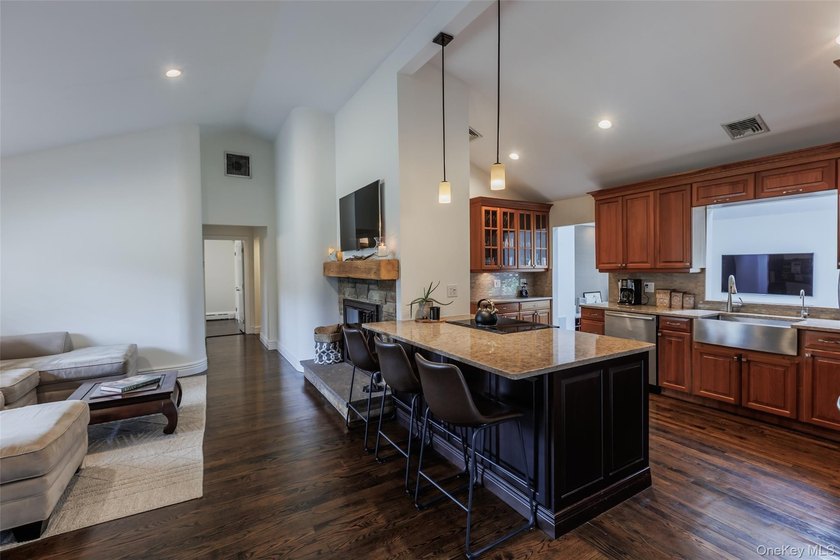 Tucked away on a lush, private three-quarter acre in the highly - photo 11