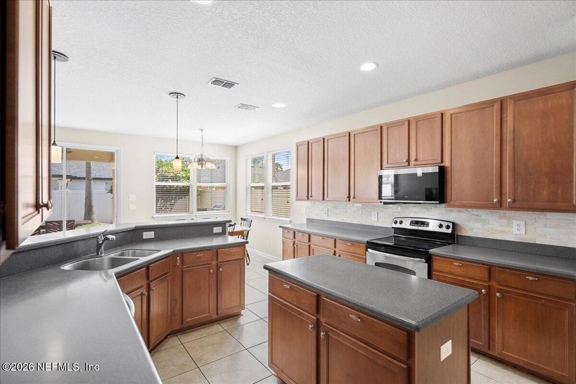 Welcome home! This inviting 3-bedroom, 2.5-bath residence is a - photo 11
