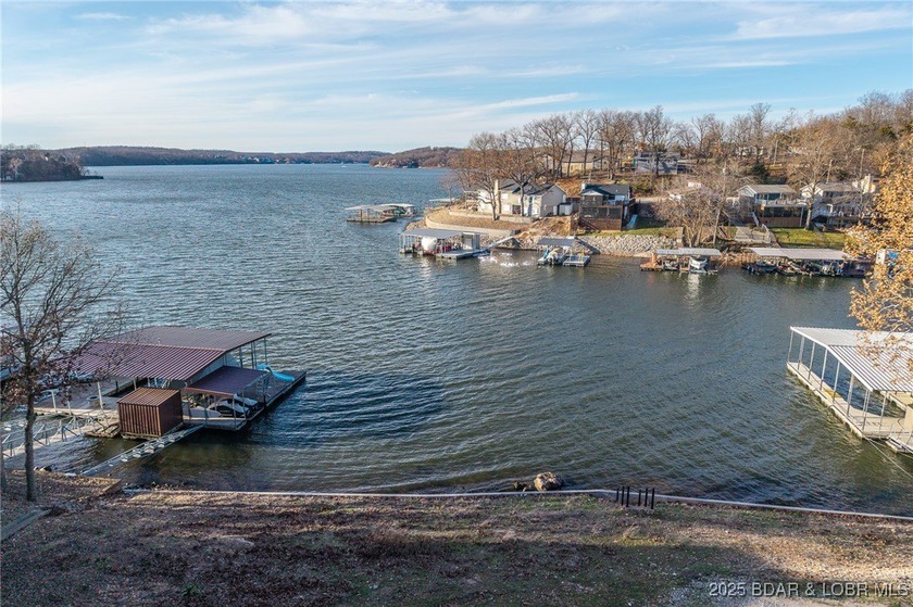 Rare Double Lakefront Lot in Highly Desirable Linn Creek Cove! - photo 12