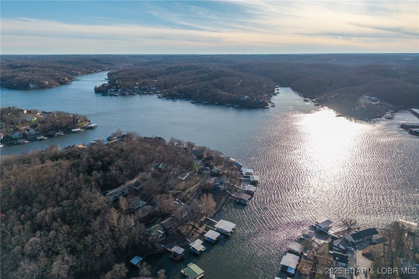Rare Double Lakefront Lot in Highly Desirable Linn Creek Cove! - photo 14
