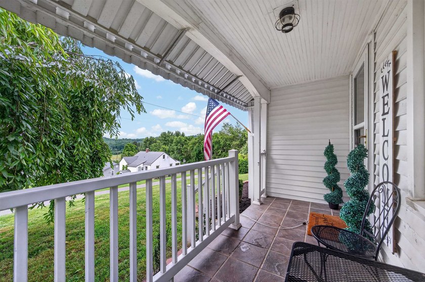 Welcome Home! This charming 1.5-story bungalow is situated on a - photo 7