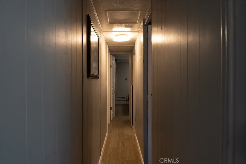 Ready to move in! This affordable, low land lease mobile home in - photo 12