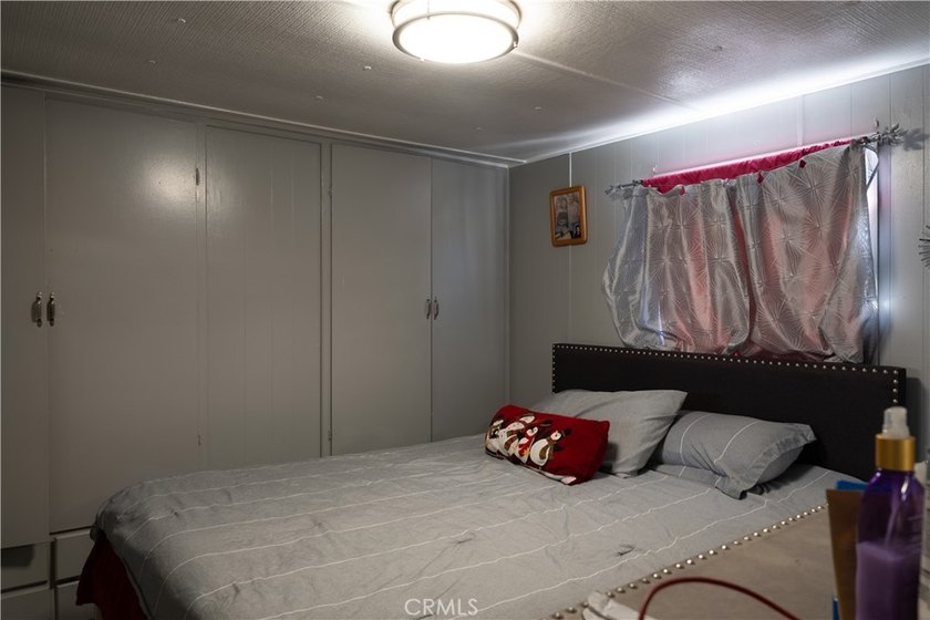 Ready to move in! This affordable, low land lease mobile home in - photo 16